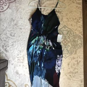 Brand new cocktail dress with tags. Size 2.